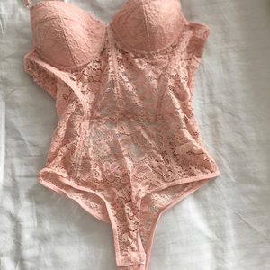 Pink lace intimates body suit